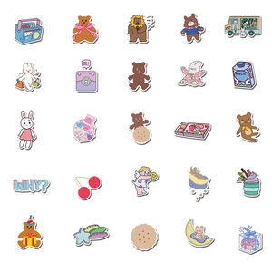 Flat lay showing 25 unique cute bear and rabbit waterproof stickers on white background