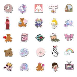 Flat lay of 25 cute cartoon bear and rabbit waterproof stickers on white background