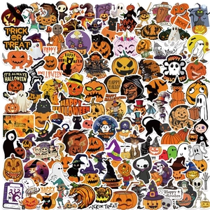 Close-up of waterproof Halloween pumpkin and ghost stickers with vibrant festive patterns