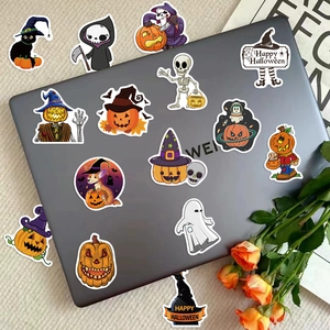 Assorted Halloween waterproof stickers with pumpkin and ghost motifs on a laptop surface