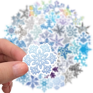 Sortierte blaue und silberne Schneeflocken-Sticker für Laptop und Koffer-Deko