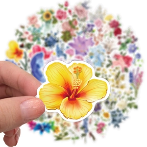 Vibrant floral stickers set with yellow hibiscus and sunflower for luggage decoration