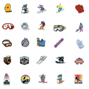 Close-up of 25 colorful skiing stickers including animals, goggles, and snowboards