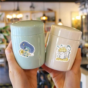 Cute ceramic cat mugs set with mint green and beige colors for cozy home decor