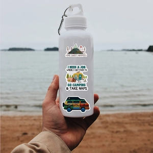 Waterproof outdoor camping stickers on water bottle with scenic lake background