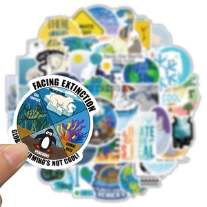 Close-up of waterproof global warming stickers featuring polar bears and eco slogans
