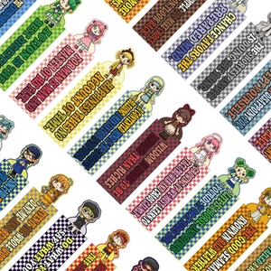 Close-up of cute cartoon girl stickers with inspirational quotes and checkerboard patterns