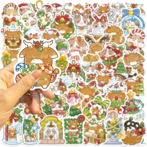 Close-up of waterproof holographic Christmas cow stickers for laptop and DIY decor