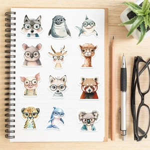 Watercolor cartoon animal stickers with glasses on a notebook with stationery background