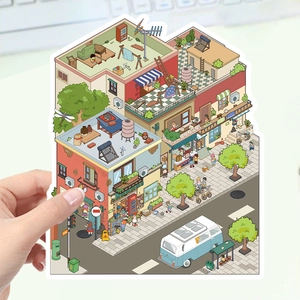 Detail of large 3D strawberry house sticker with isometric city life illustration
