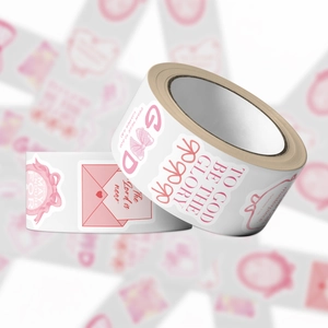 Close-up of pink bow and heart religious stickers rolls for journaling decoration