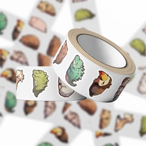 Close-up of decorative paper tape rolls featuring cute cartoon animal illustrations
