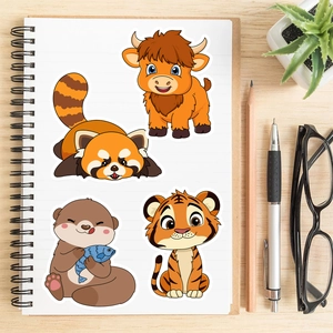 Close-up of cute cartoon animal stickers featuring a panda, highland cow, otter, and tiger