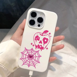 Close-up of pink Halloween phone case showing precise charging port cutouts and design