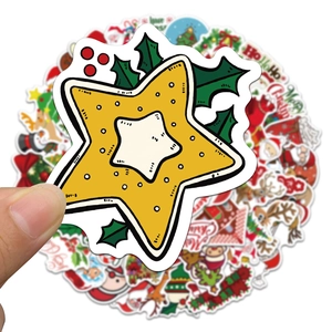 Close-up of waterproof Christmas graffiti stickers with classic festive motifs for DIY decor