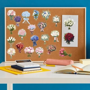 Floral PET stickers on cork board with stationery, perfect for journal decoration