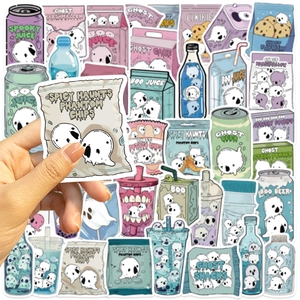 Close-up of a hand holding a cartoon ghost potato chip sticker with matte finish