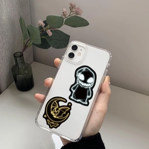 Close-up of clear phone case featuring Oogie Boogie pattern for Halloween theme