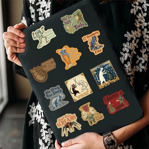 Surreal medieval graffiti stickers for laptops and guitars with artistic text