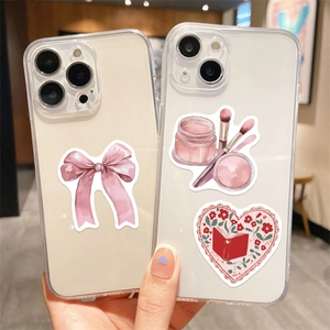Detail of transparent iPhone case with cute watercolor bow and cosmetic sticker designs