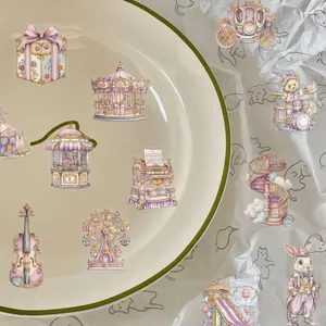 Dreamy vintage amusement park stickers with carousel and rabbits on a ceramic plate