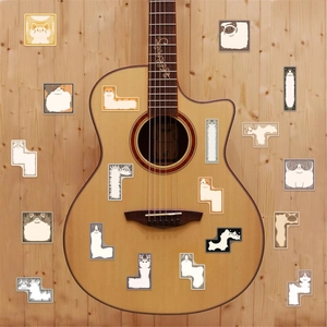 Waterproof Tetris cat stickers set on a wooden guitar for DIY laptop and guitar decor