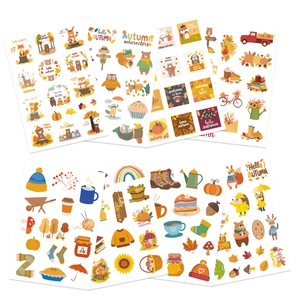 Detail showing autumn-themed stickers with foxes, pumpkins, and fall leaves patterns