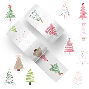 Detail view of assorted Christmas tree stickers featuring watercolor and retro plaid designs