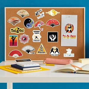 50pcs waterproof Tai Chi Kung Fu stickers on a corkboard with office supplies