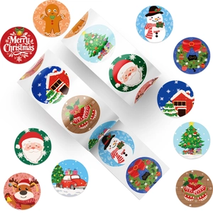 Macro shot of 500 Christmas cartoon stickers roll for gift sealing and DIY decor