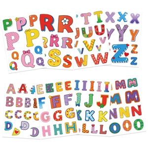 Close-up of colorful cartoon alphabet stickers featuring polka dots and heart patterns