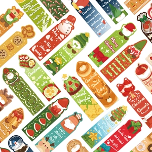 Flat lay of colorful Christmas gnome and dessert bookmarks for creative DIY journals