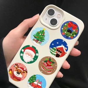 Handheld view of a cream silicone iPhone case featuring seven festive Christmas cartoon patterns