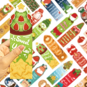 Close-up of strawberry tree shaped paper bookmark with festive Sweet lettering