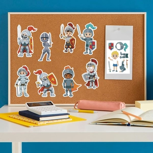 Medieval knight stickers set displayed on a cork board with stationery on a desk