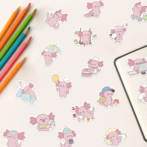 Gros plan d'autocollants axolotl roses illustrant la vie quotidienne pour déco DIY