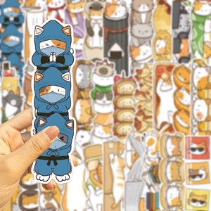 Detail shot of cute ninja cat stickers for journaling and creative DIY scrapbooking crafts