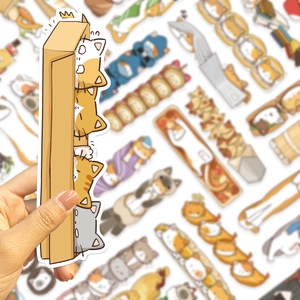 Close-up of cute cartoon cat bookmarks showing layered kitten designs on art paper