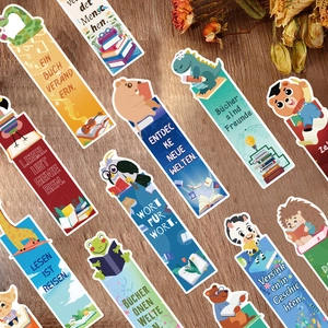 Close-up of cute cartoon animal bookmarks in German with high-quality paper texture