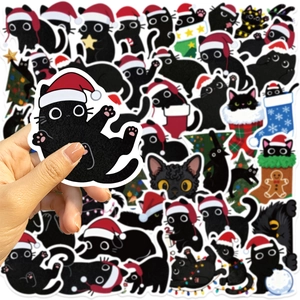 Close-up of waterproof Christmas black cat stickers for guitar and laptop decoration