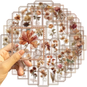 Vue détaillée d'autocollants floraux vintage en PET avec bords dentelés pour scrapbooking