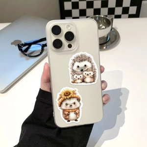 Close-up of cute cartoon hedgehog stickers on a translucent white mobile phone case
