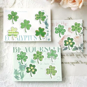 St. Patrick's Day lucky clover stickers with Good Luck text on decorative cards