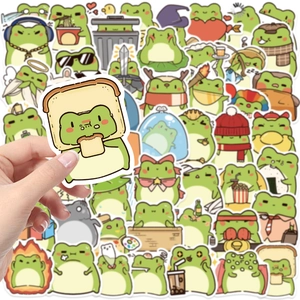 Detailed view of waterproof cartoon frog stickers being held to show size and quality