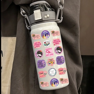 Detail of Women's Day stickers on a white water bottle with floral patterns