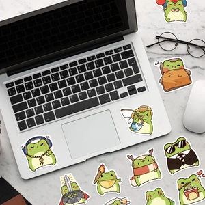 Cartoon frog stickers shown on laptop with headphones, fishing and suit styles