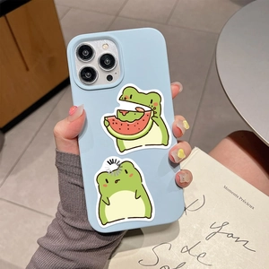 Close-up of light blue iPhone silicone case featuring two cute cartoon frog graphics