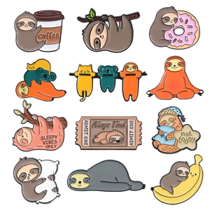 Detailed grid view of twelve unique enamel sloth pins with coffee and fruit themes