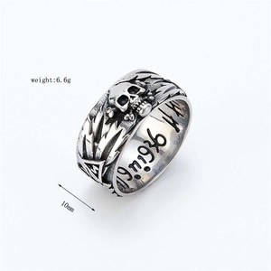 Detailed macro view of vintage skull ring with 1936 engraving and 10mm band width