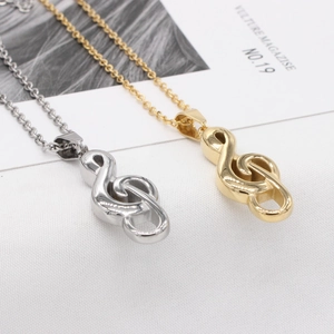 Minimalist musical note pendant necklace in gold and silver finish with fine chain